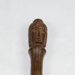 Percussore per campana con volto di Buddha