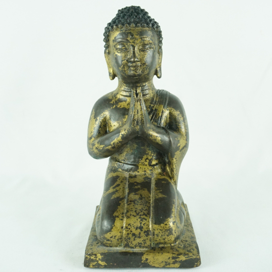 Buddha in preghiera in bronzo